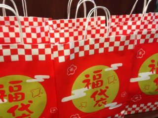Fukubukuro:a bag which contains lots of clothes and goods